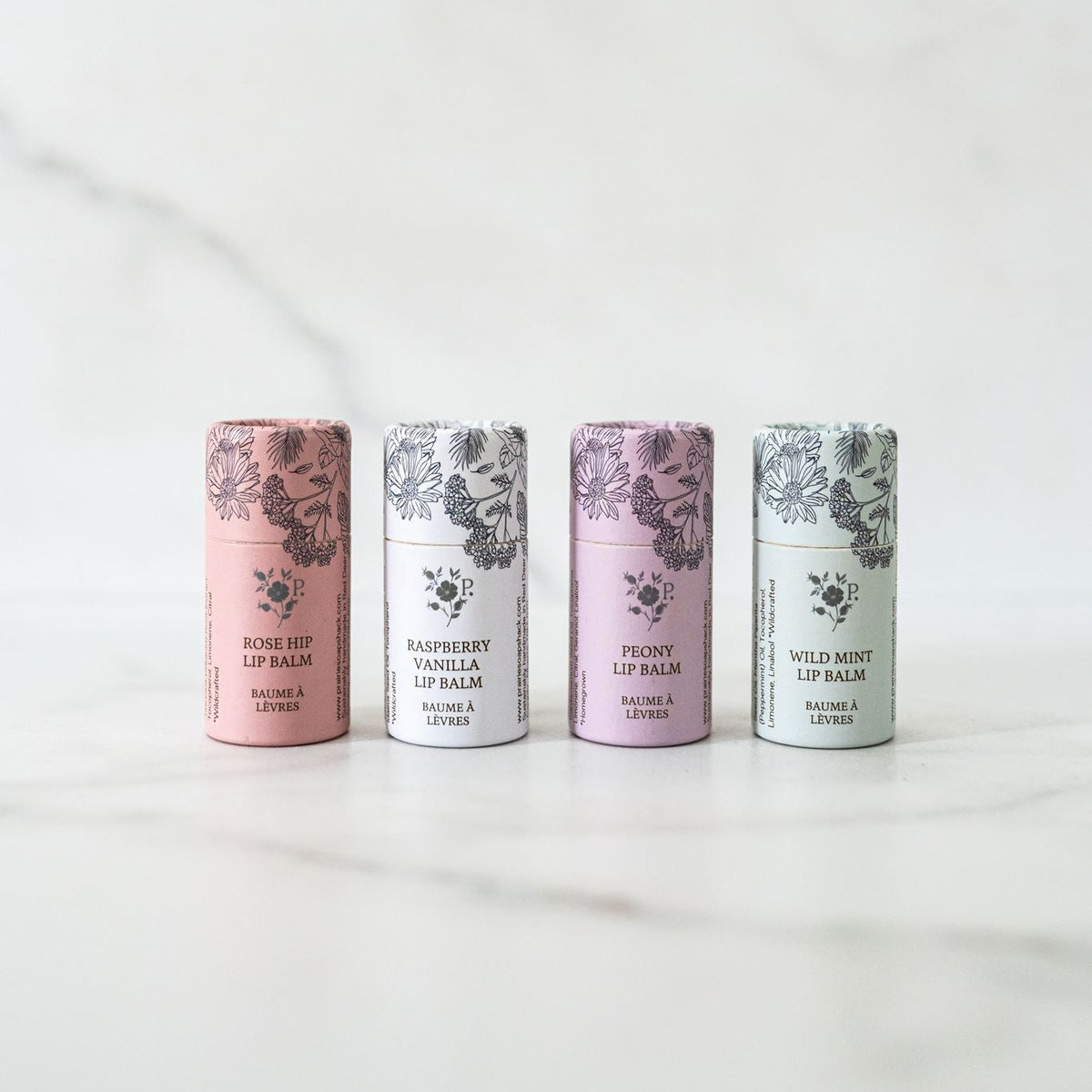 Lip Balm Four-Pack with Rose Hip, Raspberry Vanilla, Peony + Wild Mint